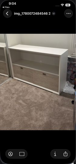 Long white and wood two door storage cabinet