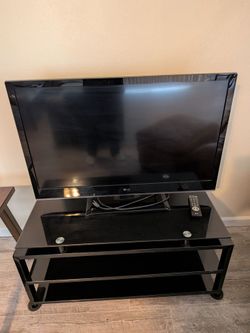 32" HD dumb TV with small entertainment center