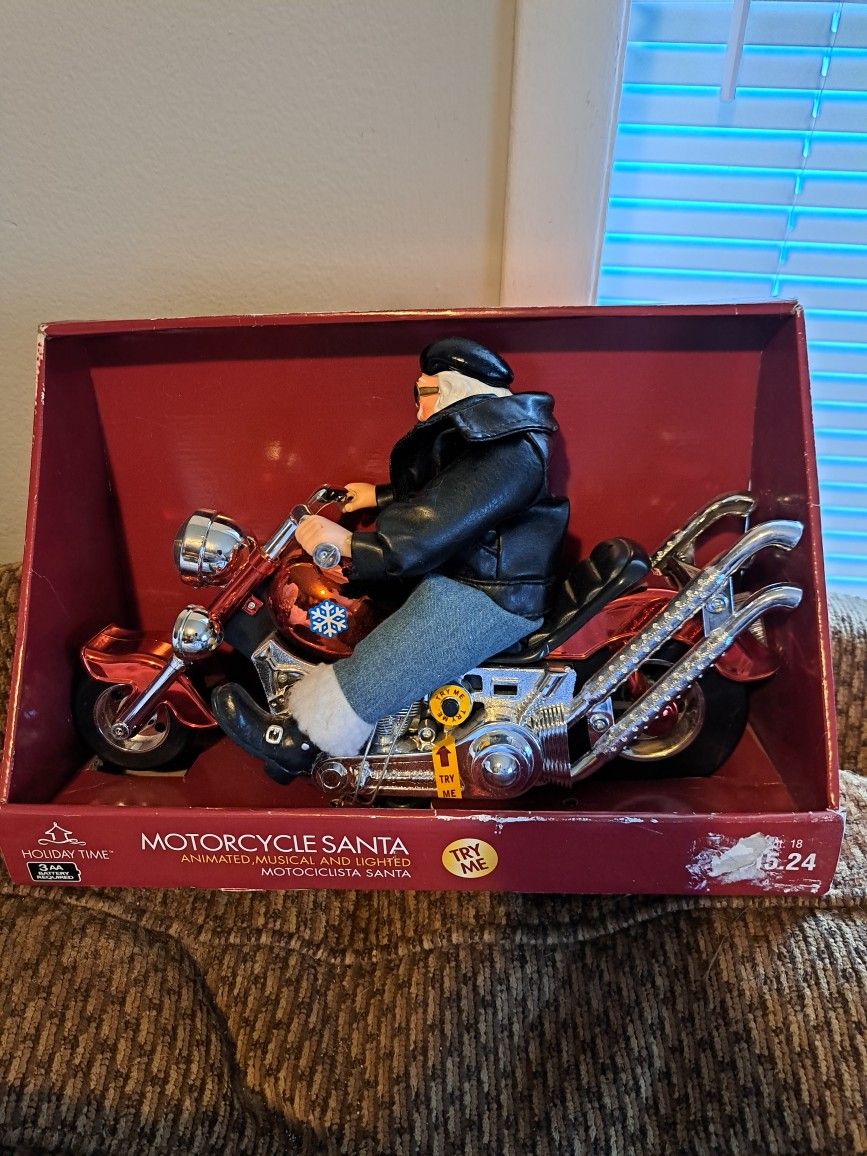 Motorcycle Santa lights and plays music