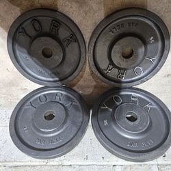 Milled vintage York 140lbs Olympic 2" weights