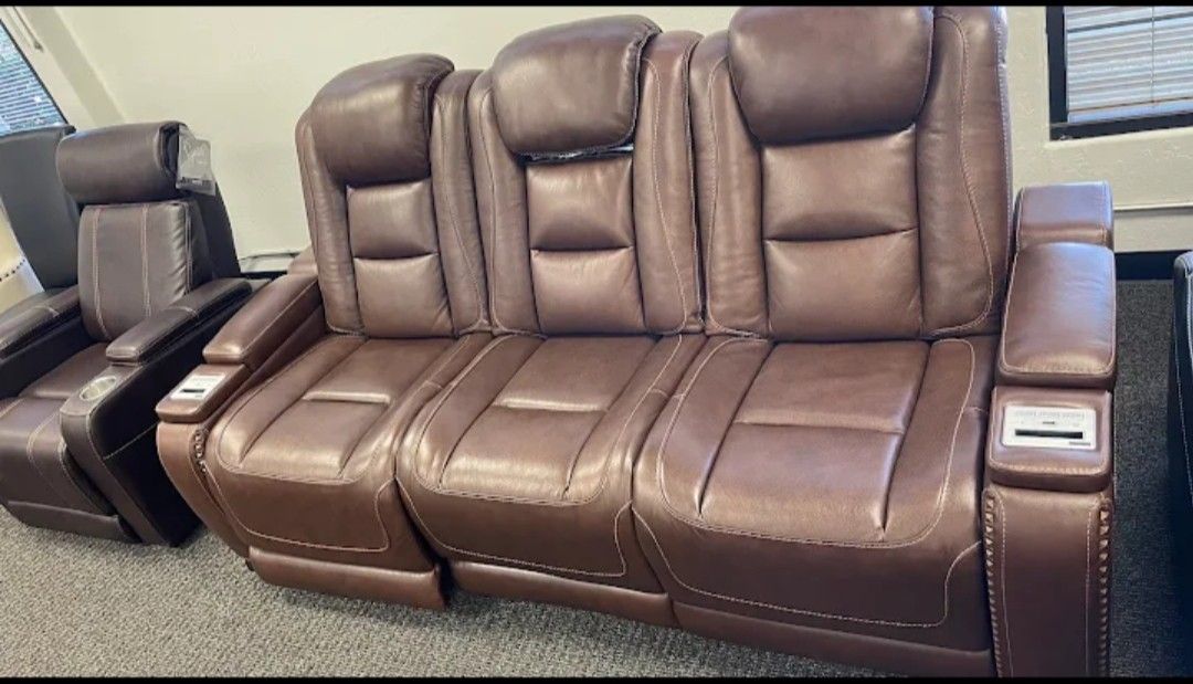 The Man-Den Power Reclining Sofa and Loveseat$20 Down Payment and delivery available 