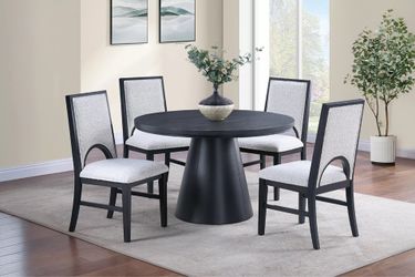 Black dining table set with white chairs