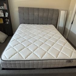 Gray bed frame and mattress