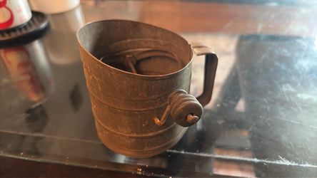 Hand cranked flour sifter