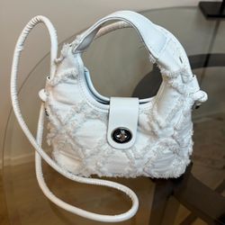 White ruffled bag