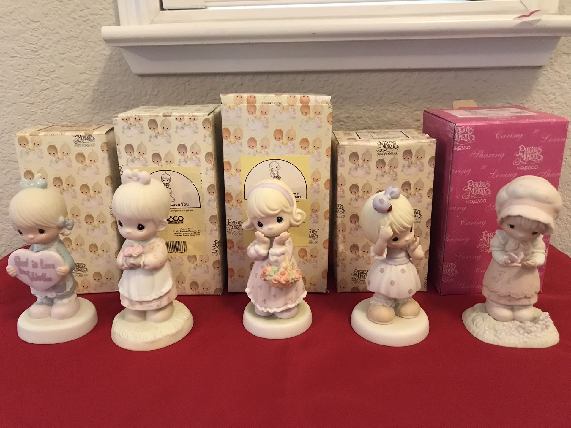 A group of 5 vintage Precious Moments figurines