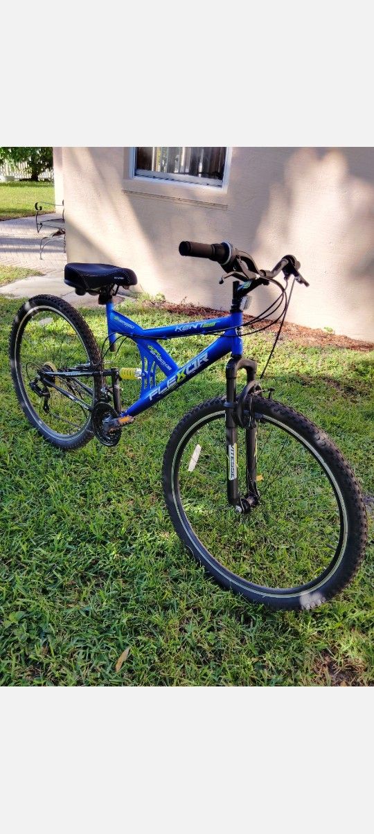 Kent Flexor 29 inch Dual Suspension Mountain Bike. 21 Speed Shimano Gears. 2 Disc Brakes. Front Shocks. Padded Seat