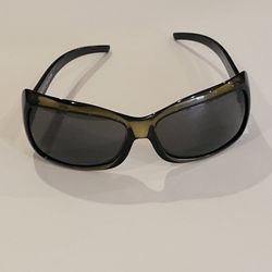 Kaenon Georgia Brown Sunglasses Polarized.  Pre-owned, lenses have very 
minor scratches, that should not impact your vision.