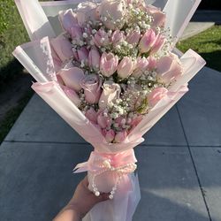 Pink roses and pink tulips bouquet