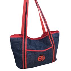 Handmade denim tote bag with red trim and a ladybug appliqué. 16”x 10”x 5” New