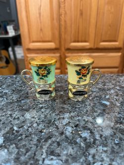Vintage Plastic Fountain of Youth Pair of Salt and Pepper Shakers.  Size approximately 2 1:2 inches tall.  Made in Japan on the bottom.  Preowned neve