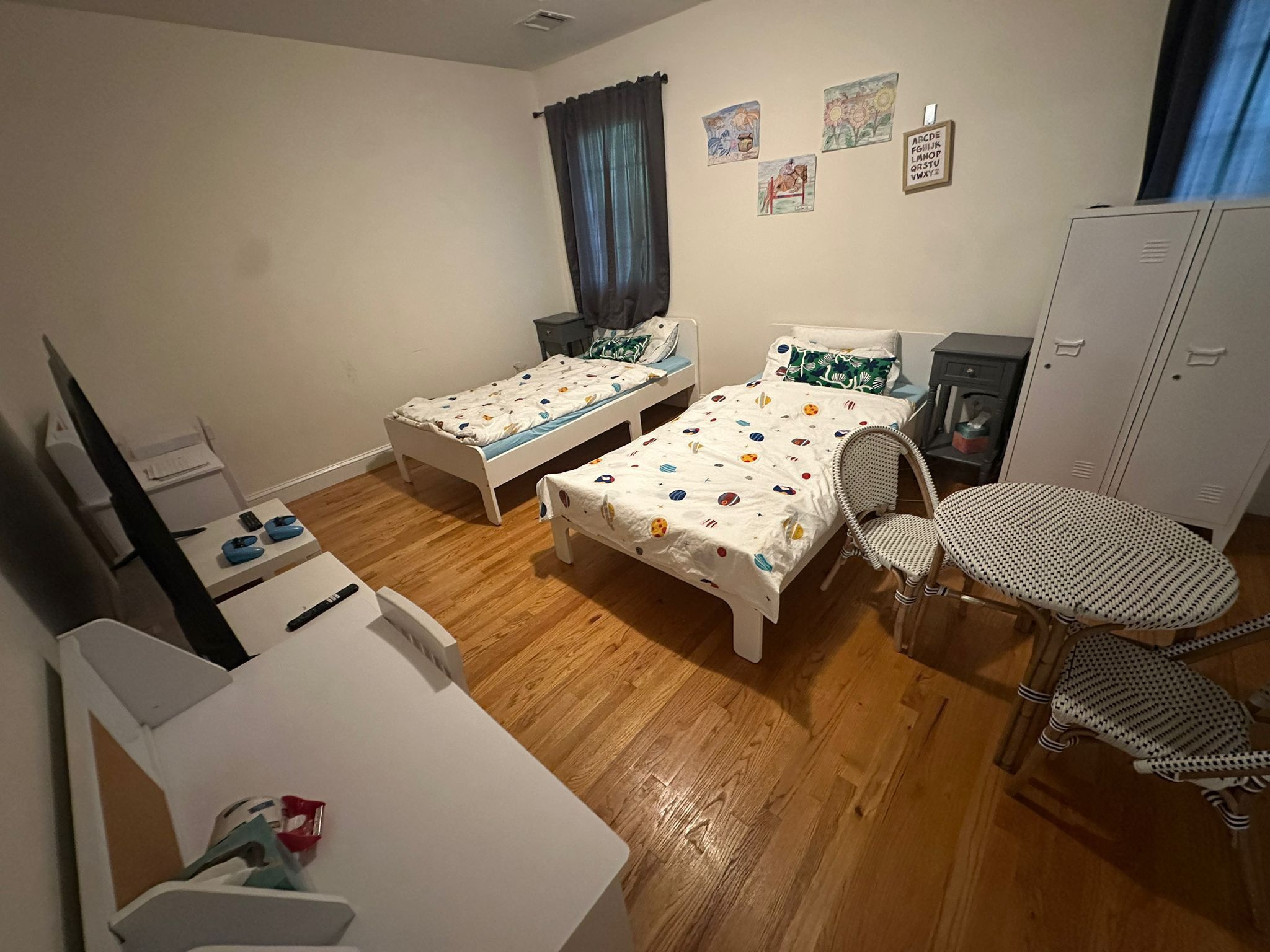 Two Beds With Desks And Side Table