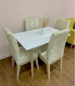 White Dining Table with 4 Cream Chairs