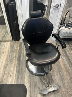 Professional barber chair great condition. Clean black leather with hydraulic lift and footrest.
