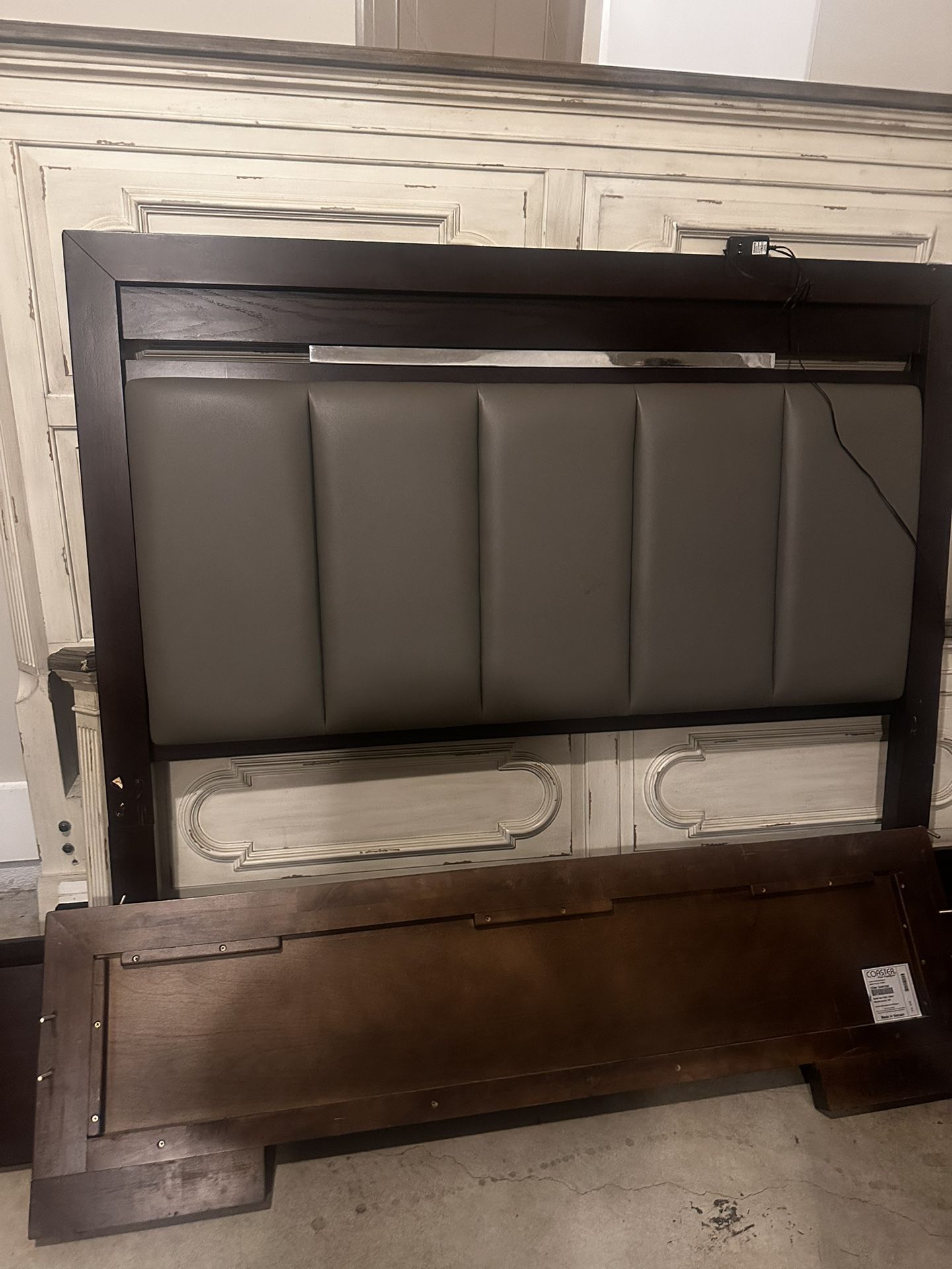 Queen sized wooden bed frame w/ light.