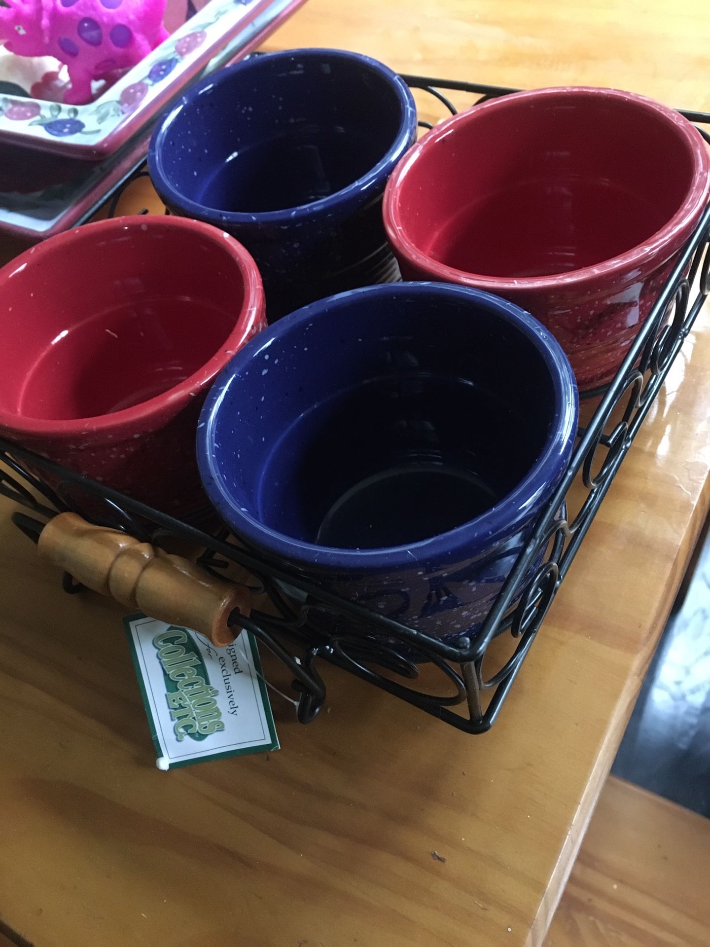 New bowls In Wire Basket With Wood Handles.