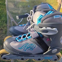 Women blue and gray rollerblades