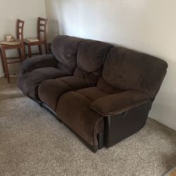 Brown and Black Reclining Sofa
