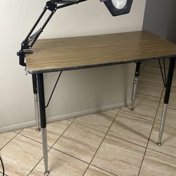 Table and magnifying