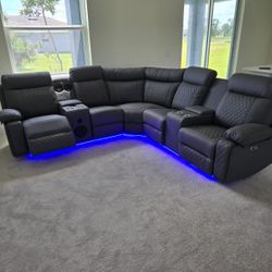BRAND NEW POWER RECLINING SECTIONAL WITH LED LIGHTS,  USB PORTS,  SPEAKERS,  CUPHOLDERS 