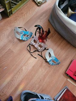 Three masquerade masks