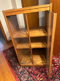 Wood cabinet with glass doors
