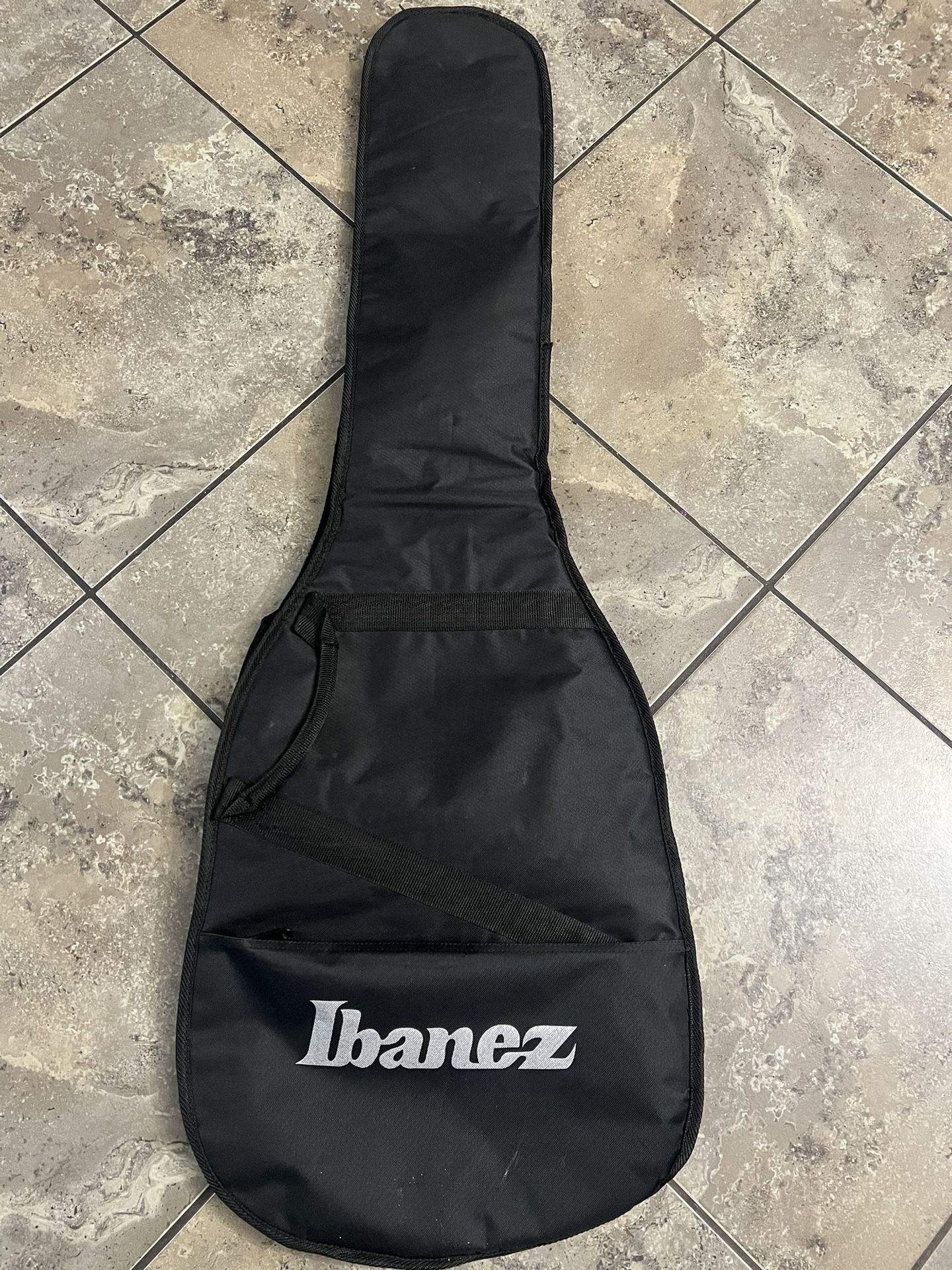 Ibanez guitar case, black 48"×16" Thin Padded And Great Shape With Defect READ. Used in great shape with one blemish. The main blemish would be the z