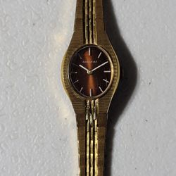 Vintage 1970's Caravelle Burgundy Face Manual Wind 