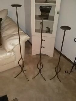 Set of three metal candle holders! $150.00