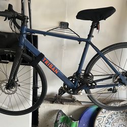 2 bikes- Triban (men); LLBean (women )