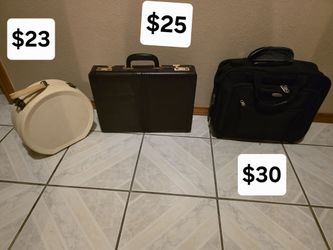 Briefcases, Rolling computer bag (handle broken) , hair dryer case $23-$30
Harlingen 