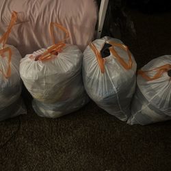 4 Bags of Women’s Clothes (Small-Medium)
