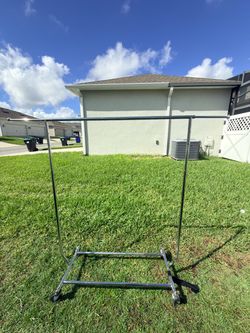 Reinforced Clothing Rack with Wheels and Adjustable Height Bars/