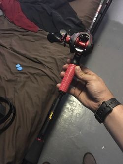 Brand New Lews Carbon Fire Rod and Reel Combo