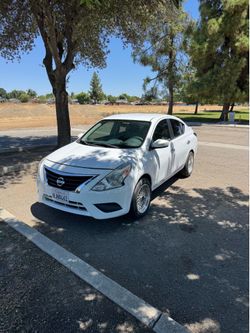 2015 White Nissan Versa