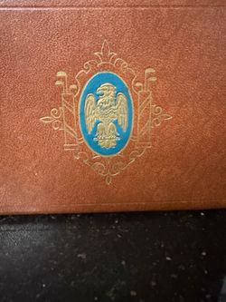 Brown leather box gilded eagle emblem on the lid 4”x6”