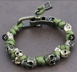 2 new Grimm head skull Bracelet. Green and black
