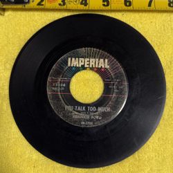 This item is a vintage Frankie Ford 45 RPM vinyl record on the Imperial label, featuring the song "You Talk Too Much". 