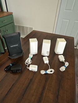 Linksys WiFi mesh , 3 nodes, and a Netgear CM1000 modem with power adapters