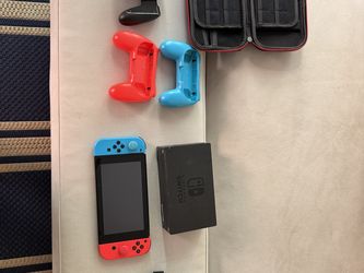 Nintendo Switch 1 with case and accessories - $160