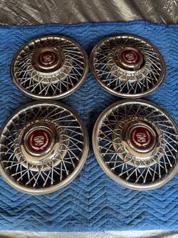 15” Cadillac Fleetwood wire hubcaps