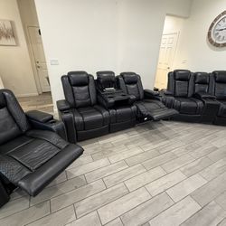 Ashley's 3 piece power reclining set - $1,500 (Santa Fe)
