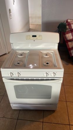 The gas stove is in good condition .