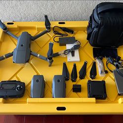 DJI mavic pro with 3 batteries, 4extra propellers, dual usb charging block, 2 extra remote to phone cables, quad charging station, and portable case