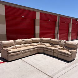 Leather pullout bed sectional