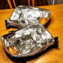 05-11 Toyota Tacoma NEW PAIR headlights chromed PAR de faros delanteros nuevos 2005 - 2011 tacoma