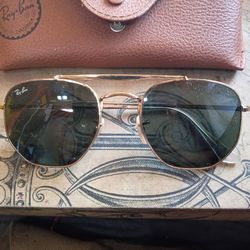 Ray Ban Sunglasses with case.