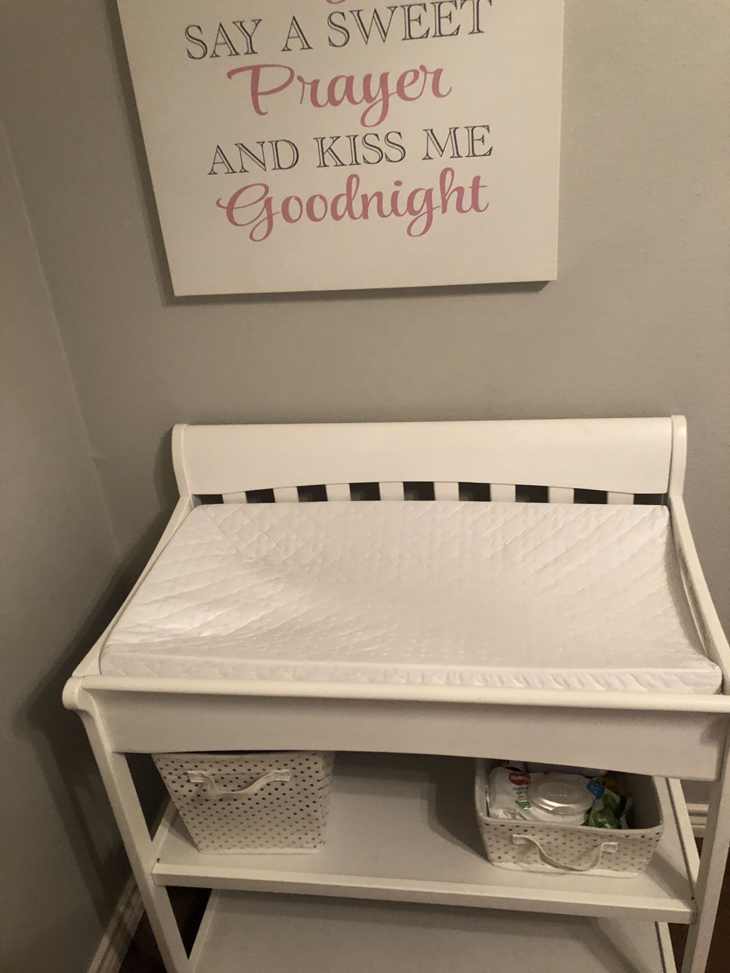 White diaper changing table w/ pad - 2 shelves underneath