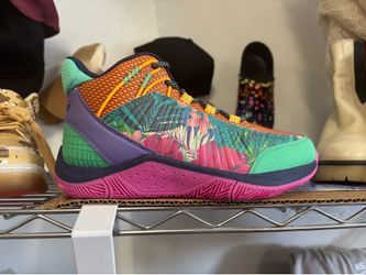And -1 vibrant multicolor basketball shoes featuring a floral and jungle-like print on the side panel.