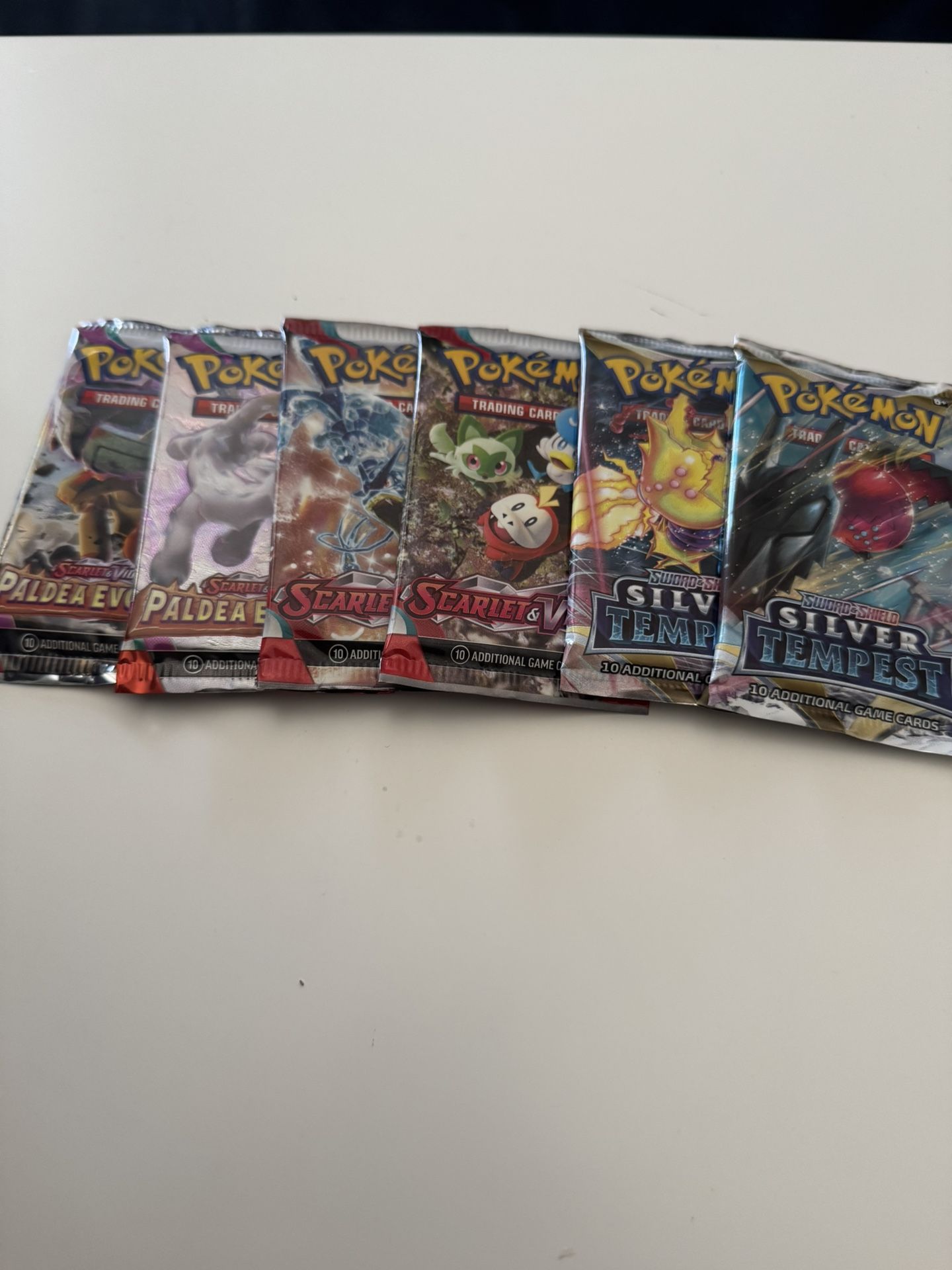 Pokemon Sword And Shield Silver Tempest, Paldea Evolved, And Scarlet And Violet Singles Pack